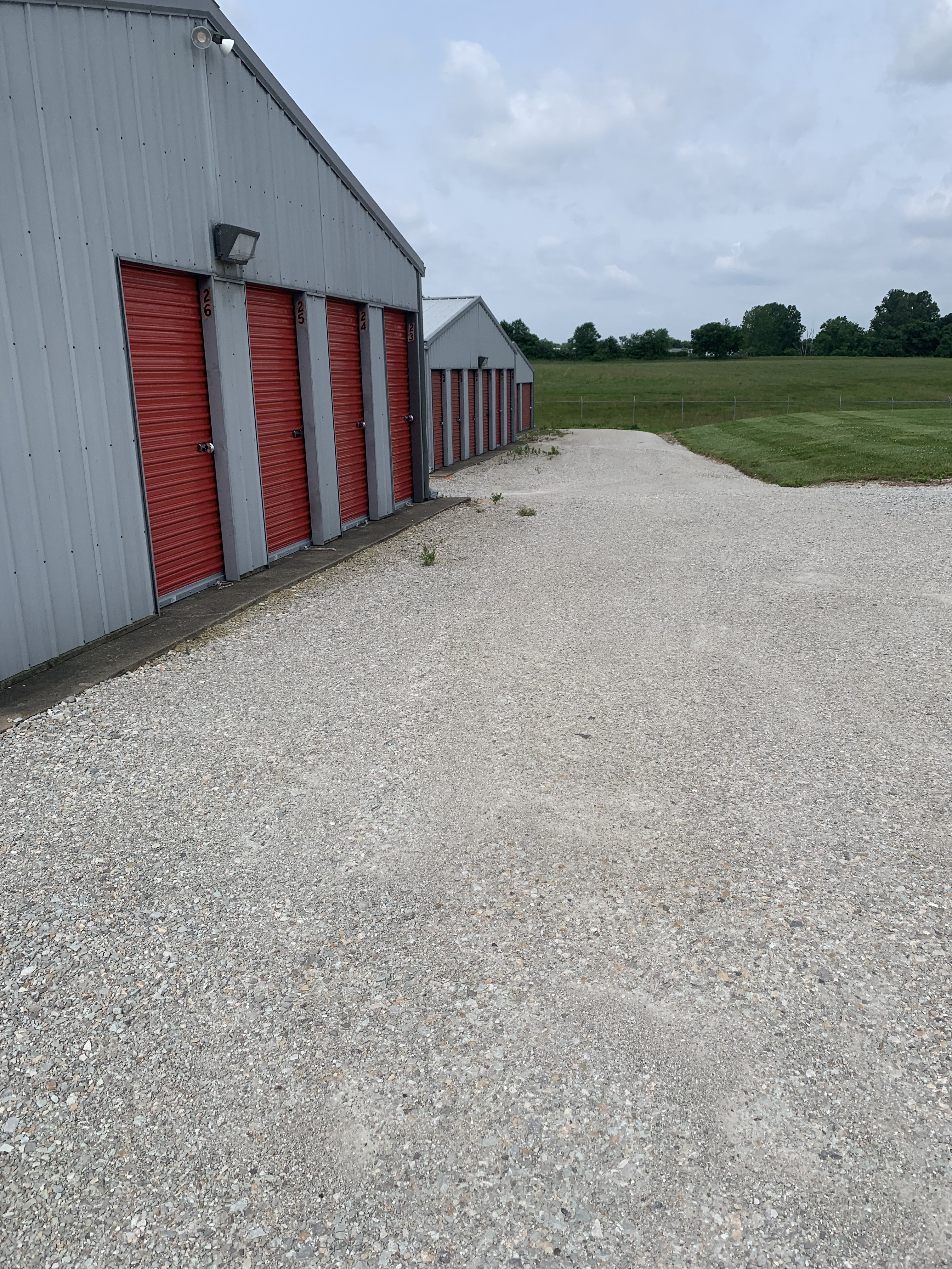 Photo showing the drive-up access at Superior Storage facility in Wheelersburg, OH, with a clear, wide driveway leading to multiple storage units, illustrating ease of access and convenience for loading and unloading.